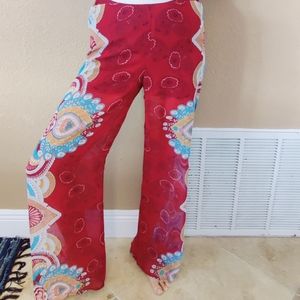 Sheer red patterned hippie pants with built in shorts